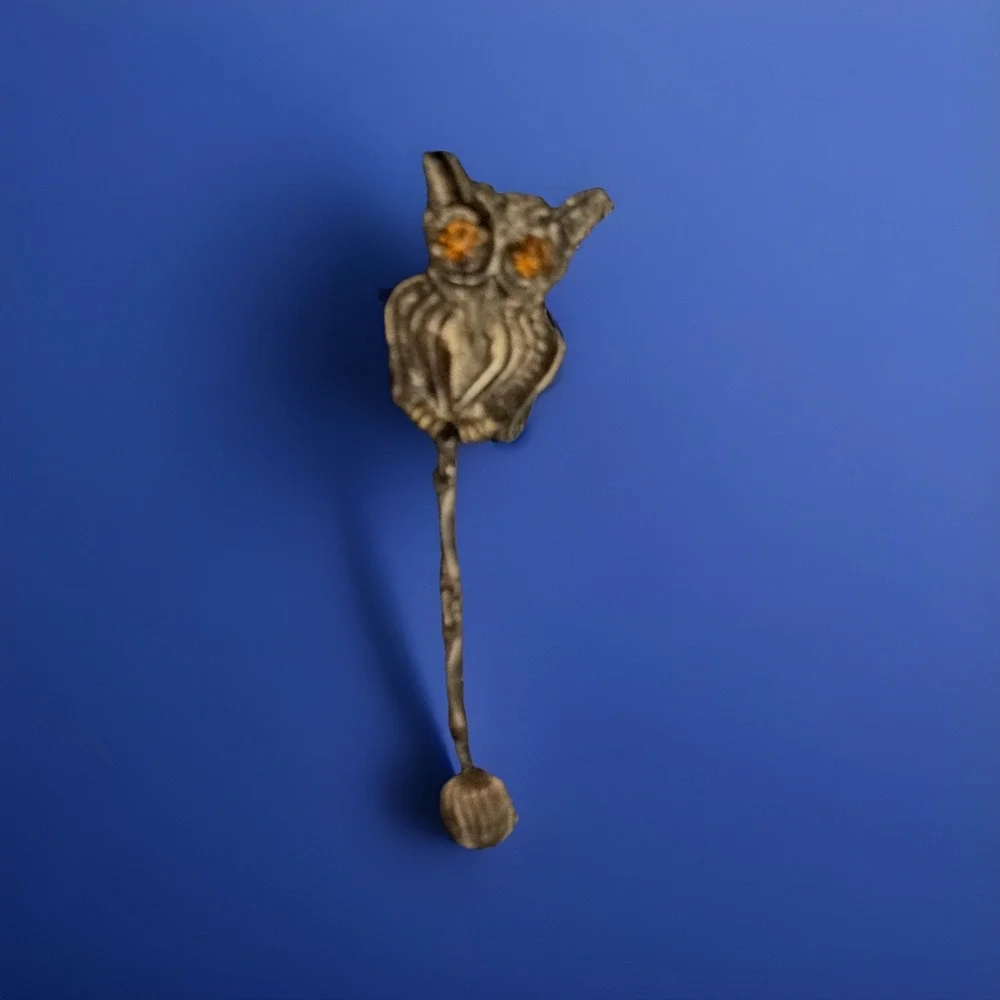 VTG Gold-tone metal articulated owl brooch with rhinestone eyes and dangle chain